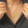 21.6k gold 1824 20 French Francs Louis XVIII coin pendant in a 18k yellow gold frame. King of France commemorative coin in smooth setting. Louis XVIII was the last French monarch to reign until his death in 1824.