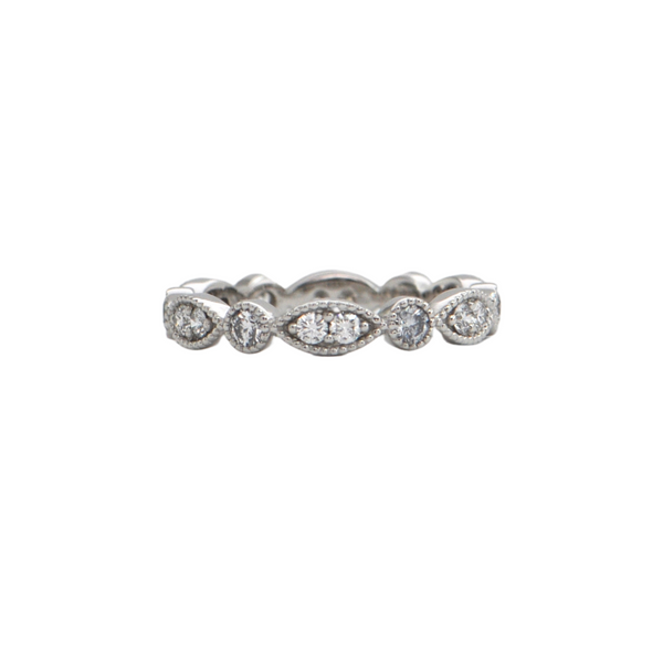 Daisy Exclusive Diamond 18K Gold Eternity Ring + Montreal Estate Jewelers